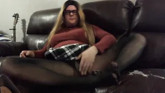 Crossdresser twink in black stockings masturbates on webcam