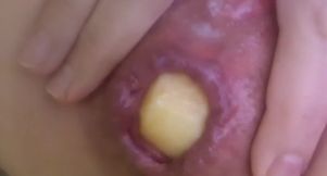 Anal insertion with a cute apple