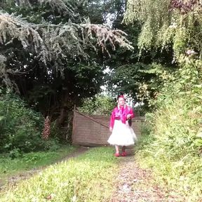 Dressed with a sheer petticoat and a fuchsia blouse for a day