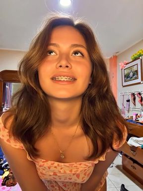 Cute teen shows off her perky boobs