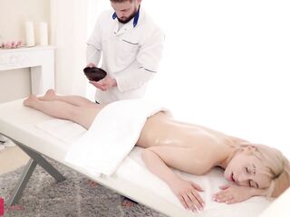 Tattooed blond with a supple body bangs after a massage