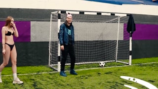 They undressed on the football field because they lost a game of football