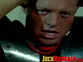Muscled master Dire Callahan continued to torment his subs cock and balls