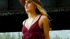 Sweet blond musician posing outdoor