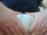 Chubby boy wets his diaper and spanks his padded crotch