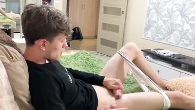 Horny twink is moaning nicely while stroking his hard cock