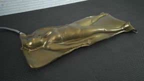 Golden vacuum bondage attempt to break free latex holds and does not let go