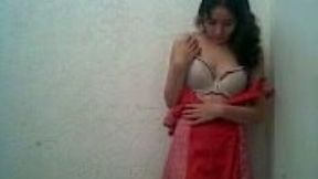 Stunning brunette teen on webcam flashes her big boobies