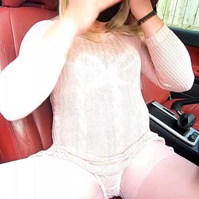 kelly cd in pink dress and pantyhose playing with her new toy in the car