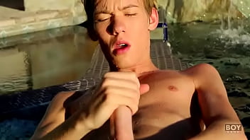 Tyler Thayer Enjoys Stroking His Massive Cock In The Pool