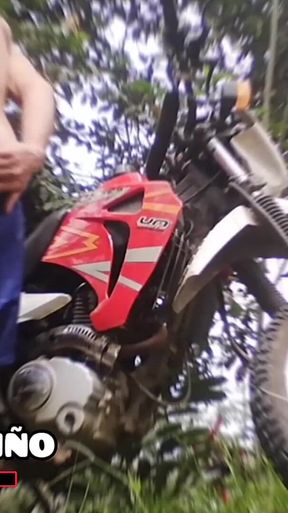 Slim and sexy young man plays with his new motorcycle and spreads his nice ass wide