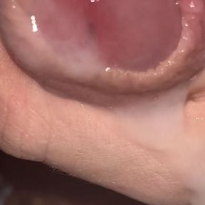 wet foreskin play close up with cumshot inside foreskin.