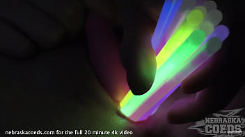 opening up teen pussy with glowsticks