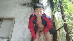 Super Asian boy lies in abandoned factory area, lying in sink, masturbating, ejaculating, moaning, and swallowing liquid
