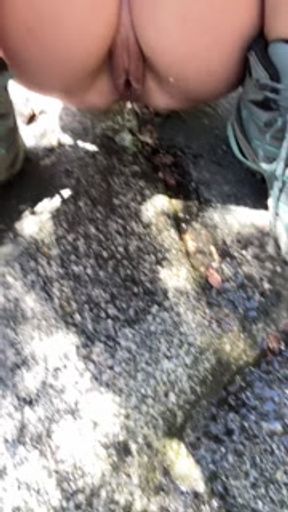 Hot 40 Year Old MILF Takes A Long Piss Outside On Her Hike With A Great Looking Shaved Pussy