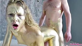 Beauty In Gold Paint Sucks Cock And Fuck