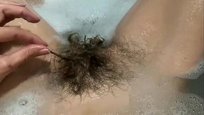 Hairy bush underwater in the bathtub