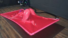 Experiments in a pink latex vacuum bed with poses