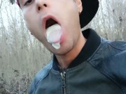 Twink uses cum filled condom after fuck like bubble gum and puts on a condom on his tongue