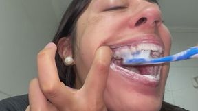 I brush my teeth and tongue until I reach the uvula.