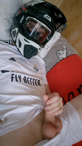 The Guy Is Wearing a Soccer Uniform and Mxhelmet with a Morning Cum