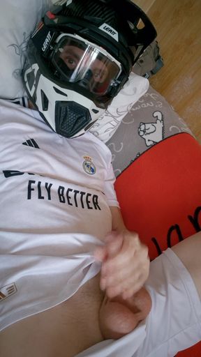 The Guy Is Wearing a Soccer Uniform and Mxhelmet with a Morning Cum