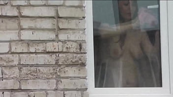 Naked in public. Nude. Outdoor. Outside. Husband Sexy Frina is spying on her from car window when she washes apartment window no panties and bra.