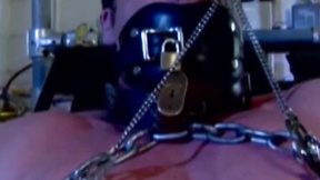 Man with muscles cant scream while being heavily chained