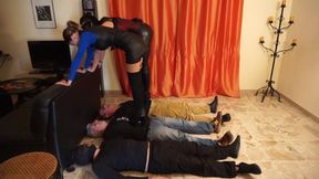 Dominant Ladies Trampling Submissive Men in Leather