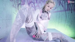 Tattooed teen girl with glasses rides and sucks tattooed cock