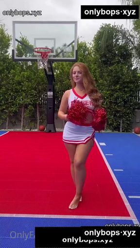 Cheerleader in gym