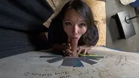 Goth Babe Deepthroats Hard Dick Through Famous Glory Hole Stall