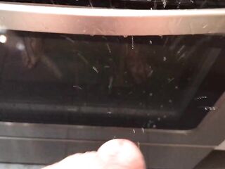 Pissing all over my kitchen stove and floor