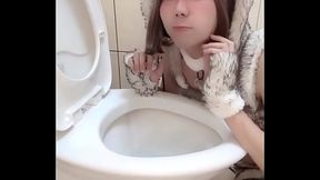 Femboy cosplaying in cute, fluffy beast outfit, enjoy on licking the toilet