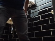 peeing in a public black toilet