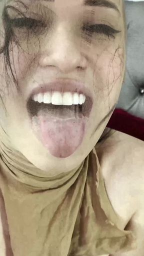 Memorable moment from &quot;Two hot Latinas with a very special clothing fetish&quot;