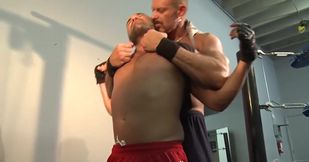 A couple of muscular men are taking a break and fucking