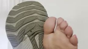 Stinky feet no socks out of sneakers after a jog