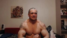 Mature Guy Flexes to Camera