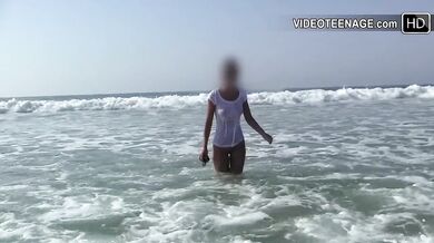 18 years old brunette naked at beach