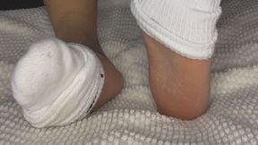 Tiippy does and sock tease puts oil on her feet with no hands