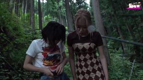 A Blonde and a Dark-haired Beauty Share Wild Passion Beneath the Open Sky -b