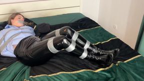 Office girl is tied up with duct tape and try to escape