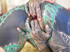 Tattooed girl fingering her pussy and ass