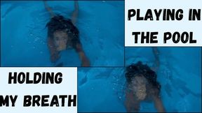 Playing in the pool and holding my breath