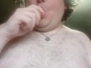 Sean enjoyin a hot dog