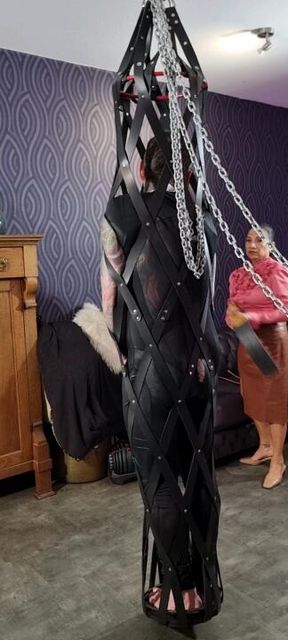 When you restrained in a leather hang cage