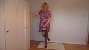 Hold up black stockings and G-string