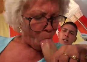 Horny granny pokes her hairy pussy with big pink dildo