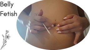 Playing with my very hot belly button